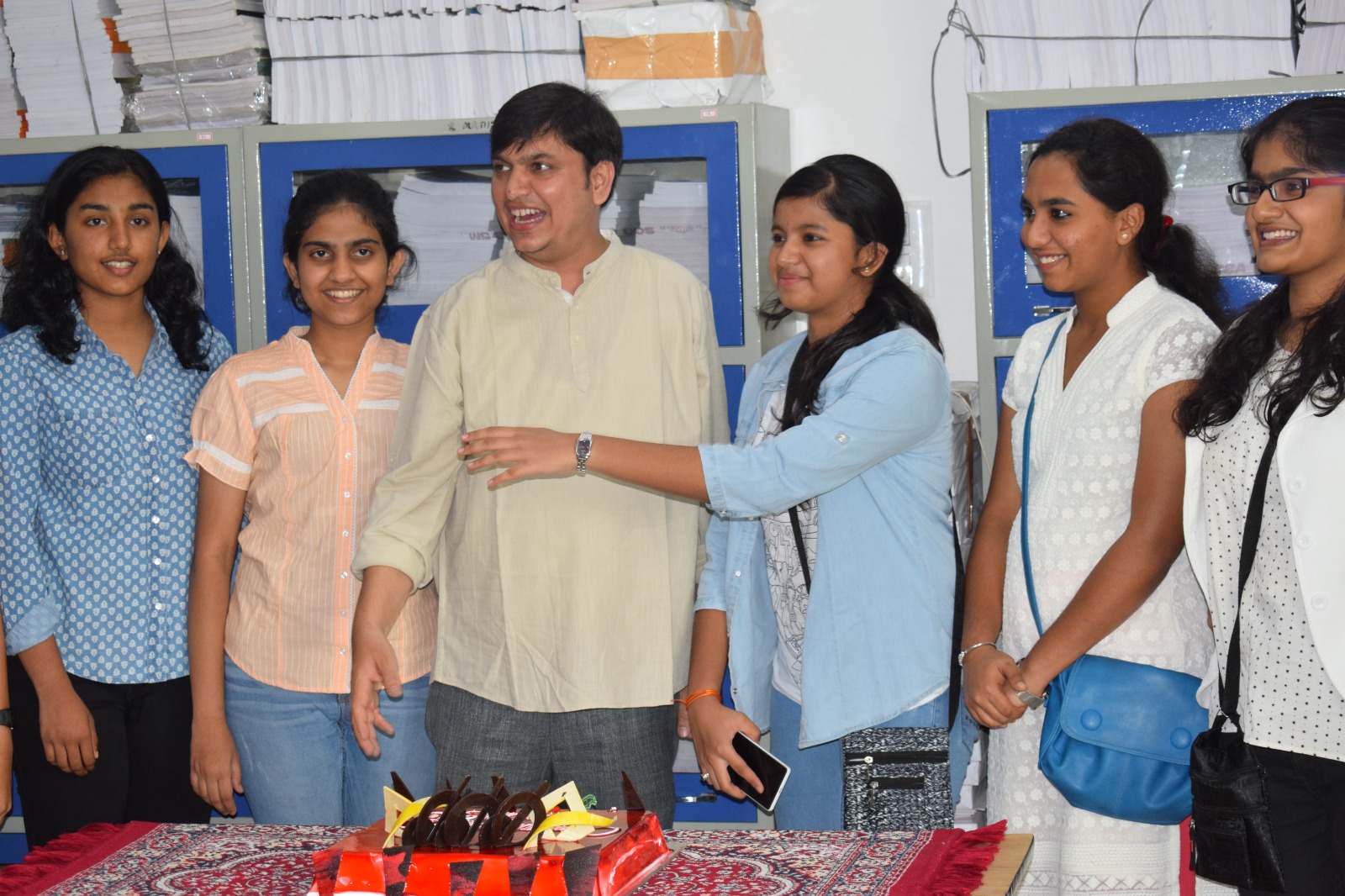 Students in a focused evening coaching session at Tattwa Medha Academy